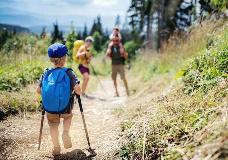 Happy family hiking