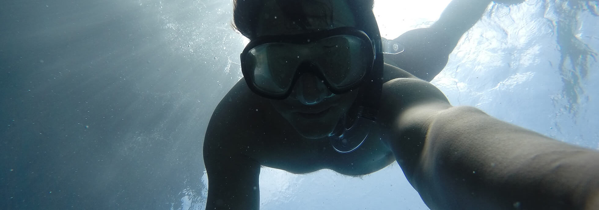 Man swimming under water